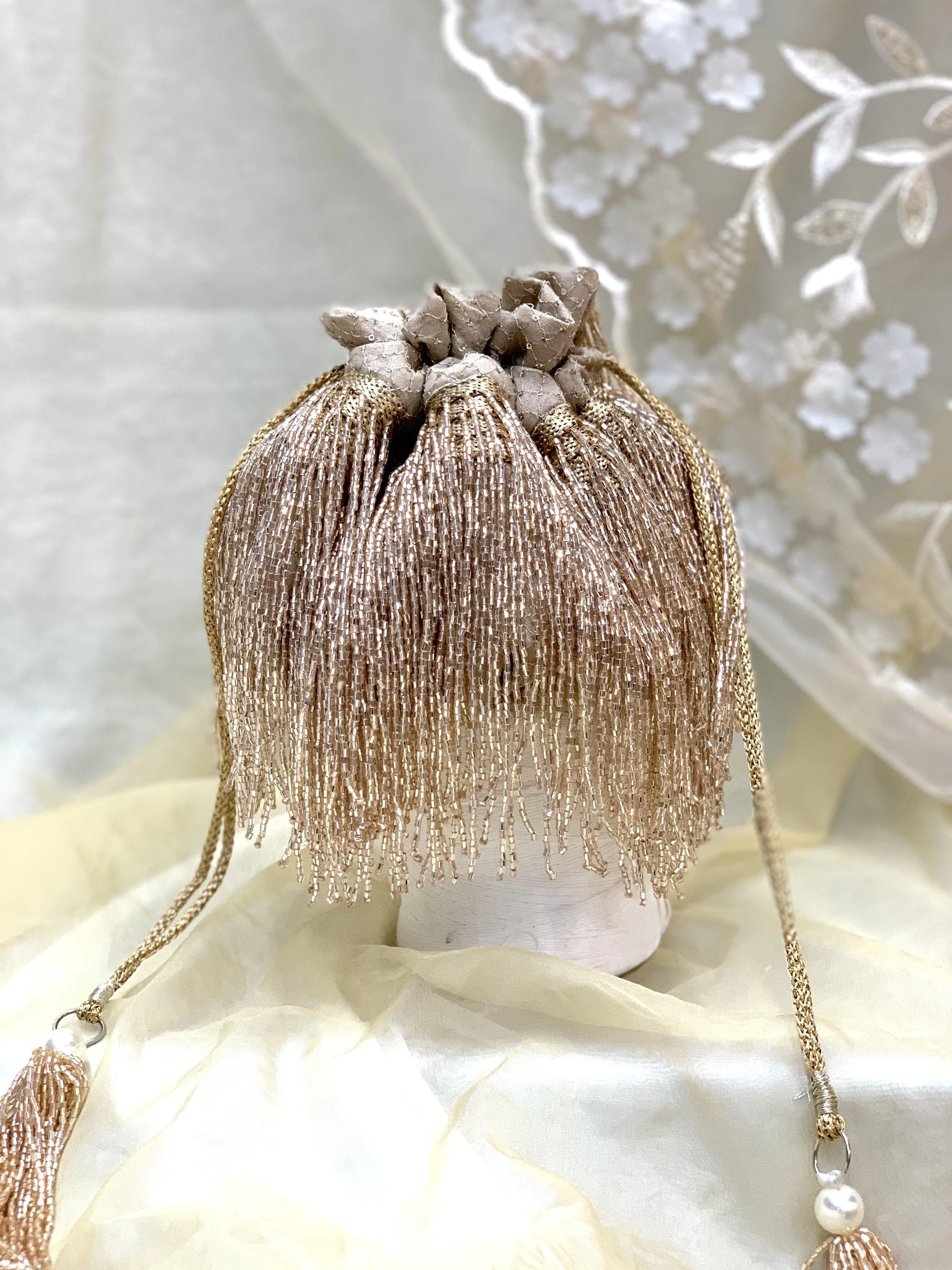 Cleopatra Collection: Rose Gold Tassels Potli