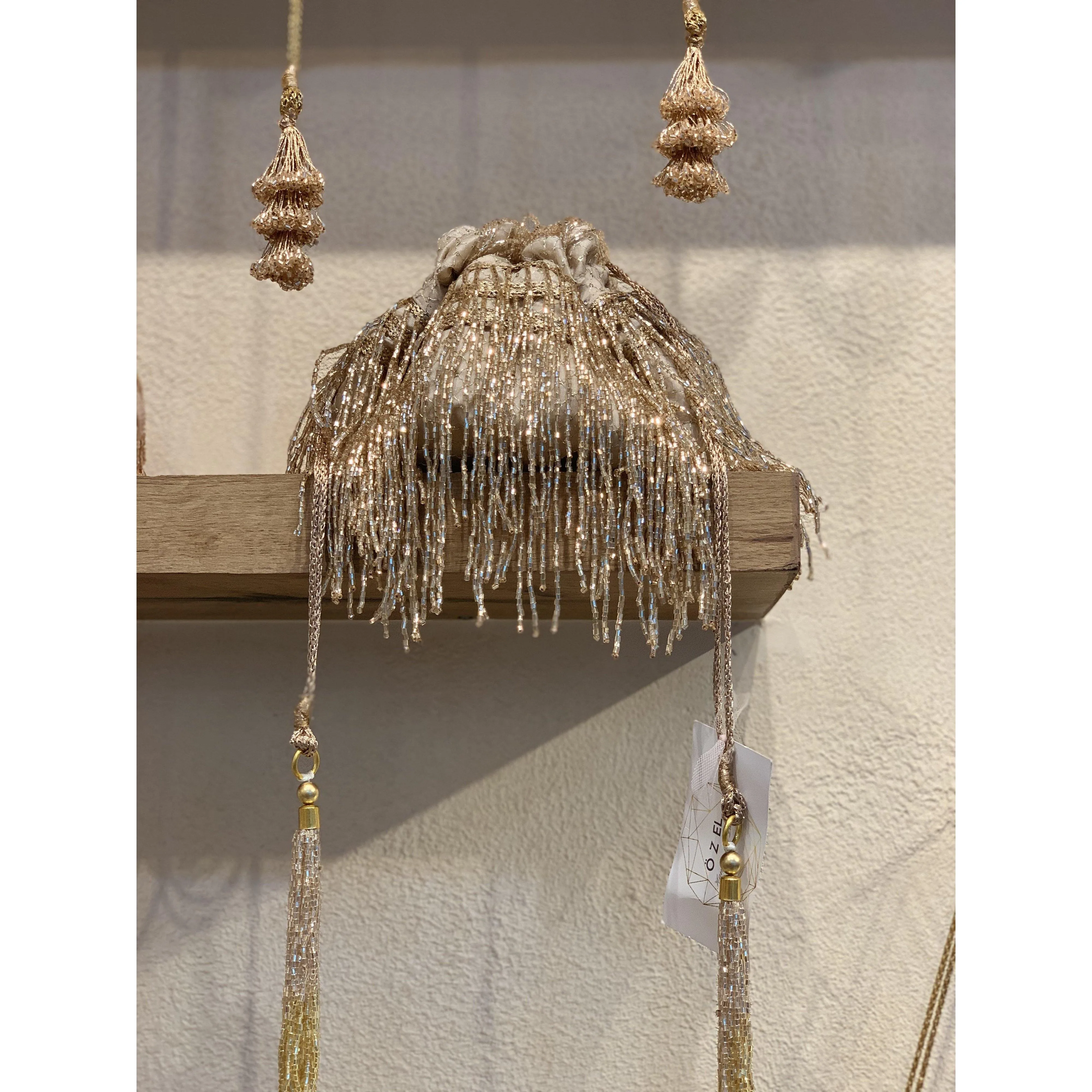 Cleopatra Collection: Rose Gold Tassels Potli