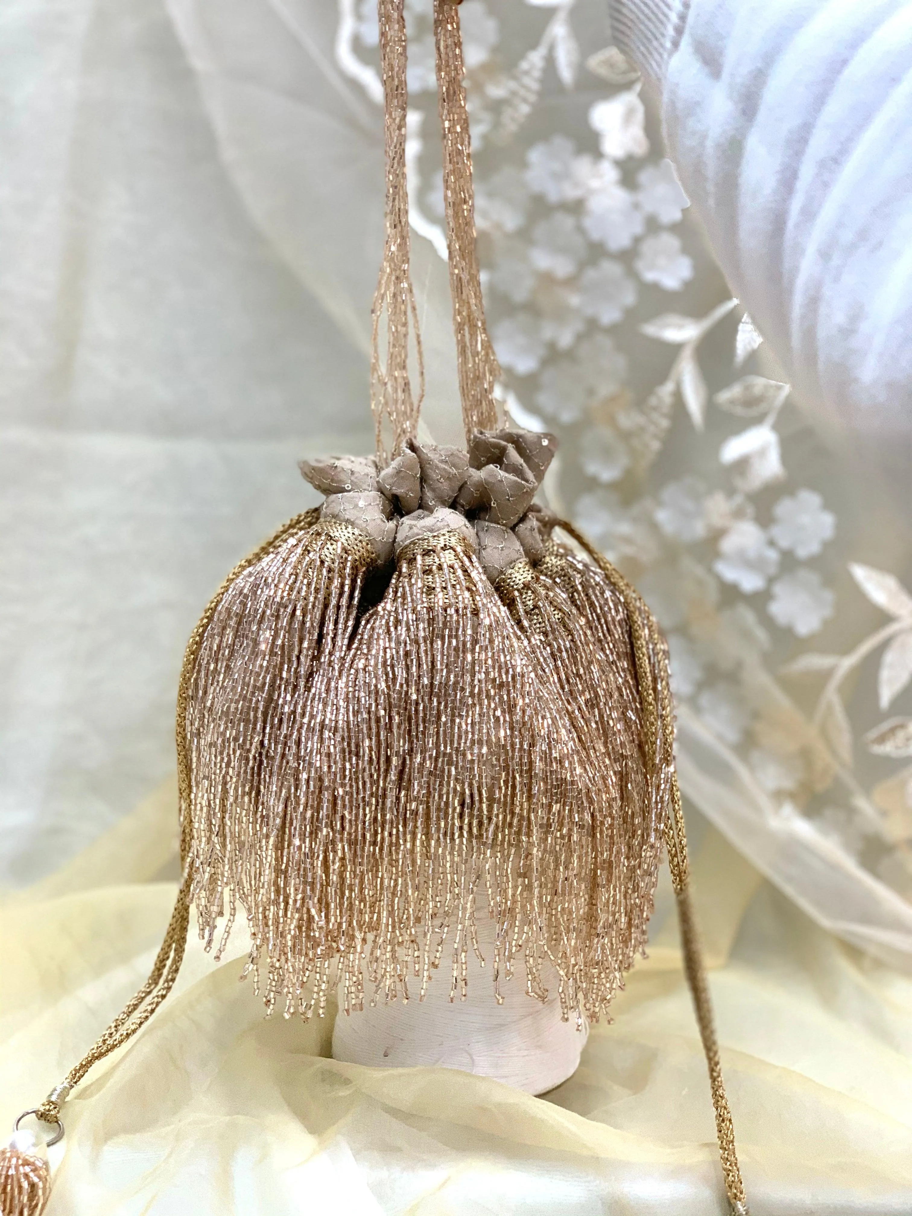 Cleopatra Collection: Rose Gold Tassels Potli
