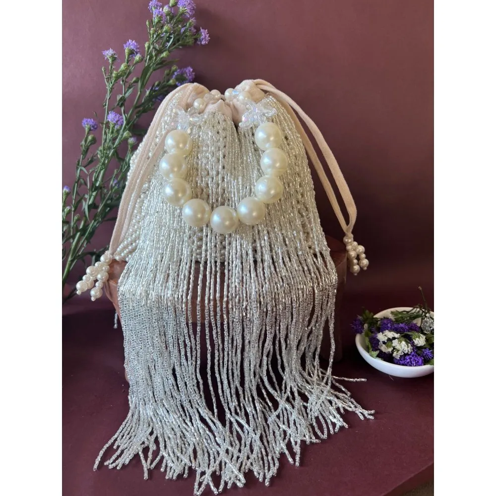 Nayaab by Sonia Tossel Ivory Potli Bag