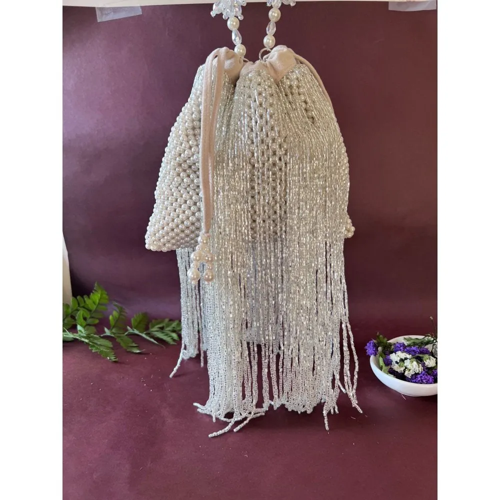 Nayaab by Sonia Tossel Ivory Potli Bag