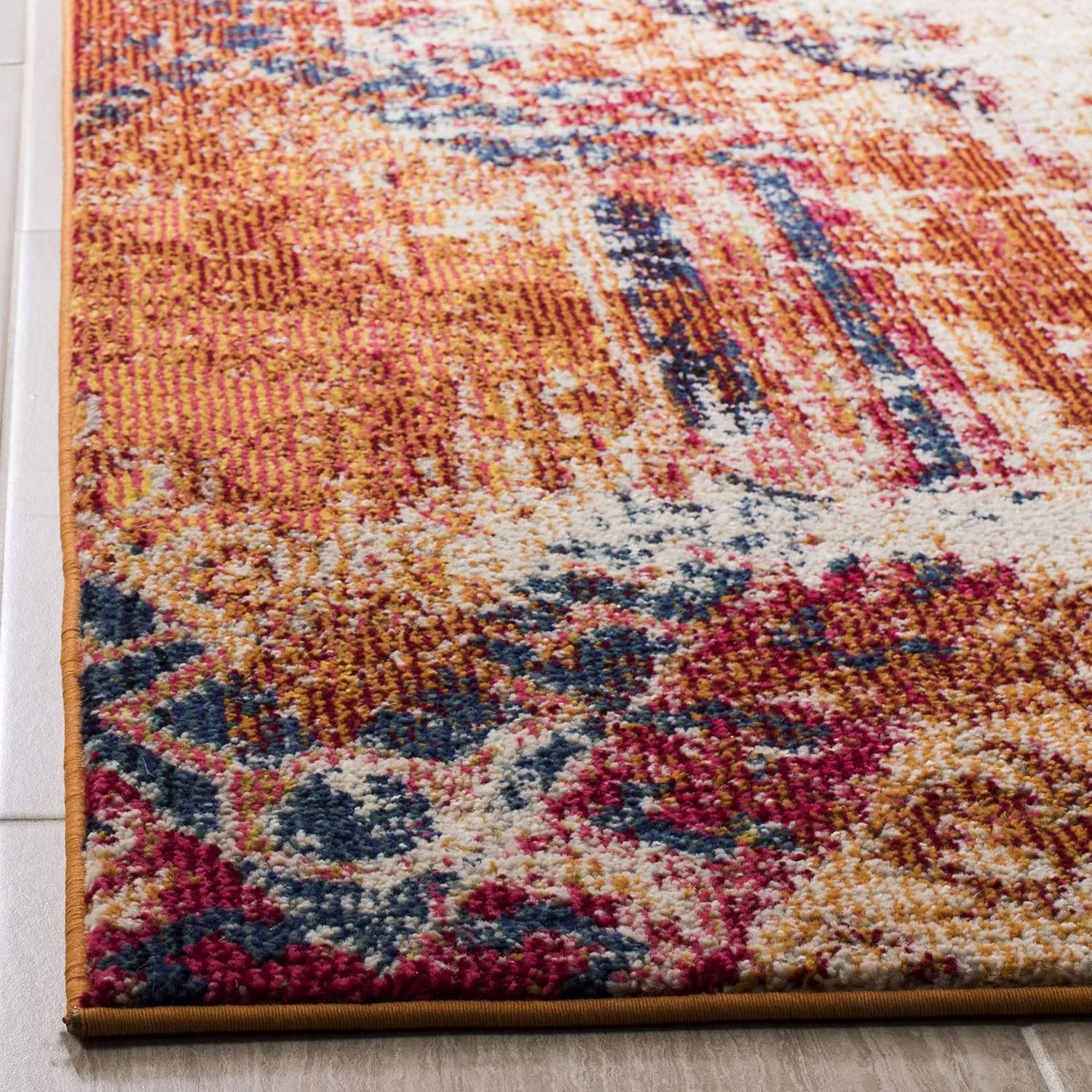 SAFAVIEH Monaco Collection Area Rug - 6'7" x 9'2", Orange & Multi, Boho Chic Tribal Distressed Design, Non-Shedding & Easy Care, Ideal for High Traffic Areas in Living Room, Bedroom (MNC222H)